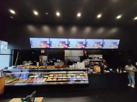 CrownTV digital menu board at Gourmet Deli