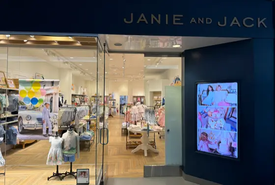 CrownTV window digital signage at Janie and Jack Store